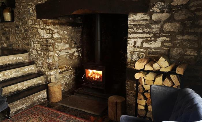Sit back and relax after a meal next to our cosy wood fire.